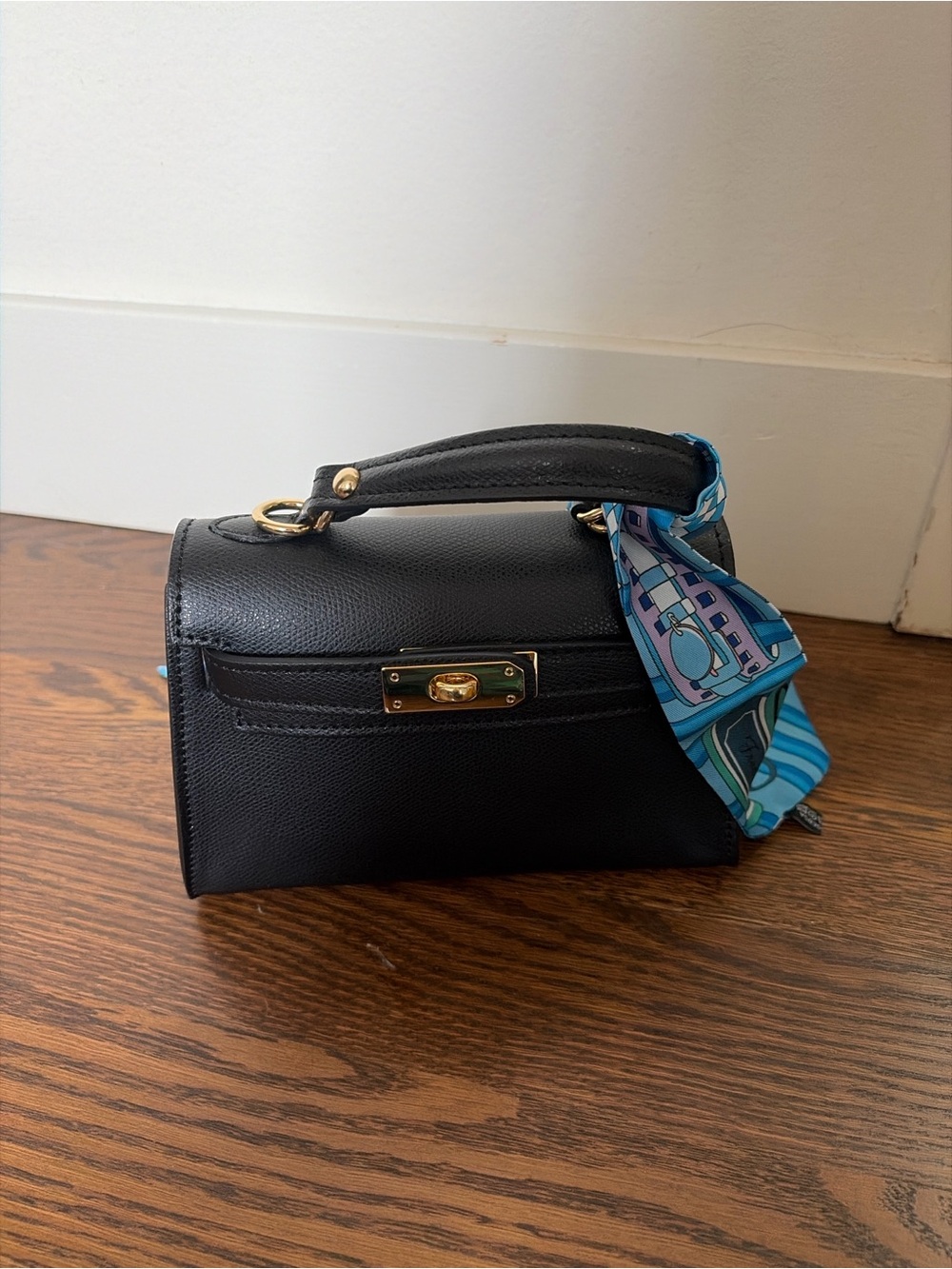 Black Top-Handle Women’s Bag with Blue Scarf Accent